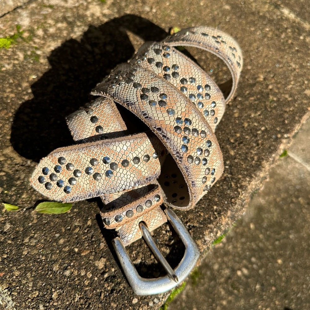 B. Belt snake embossed studded belt